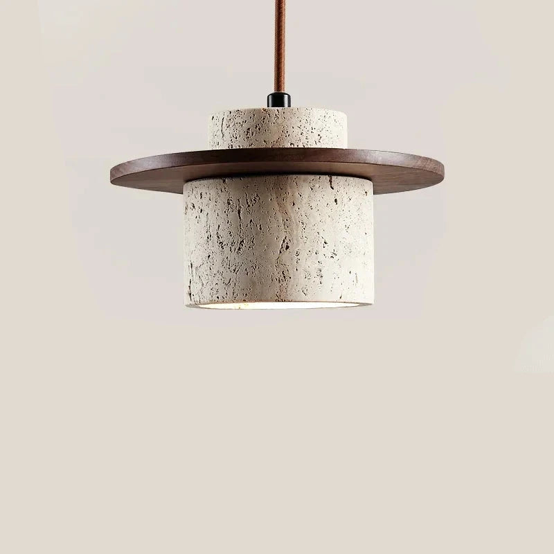 Cette suspension élégante combine harmonieusement la pierre naturelle et le bois pour un design unique et moderne. Idéale pour une chambre à coucher ou un salon, elle diffuse une lumière chaleureuse tout en apportant une touche de style organique et raffiné à votre intérieur.