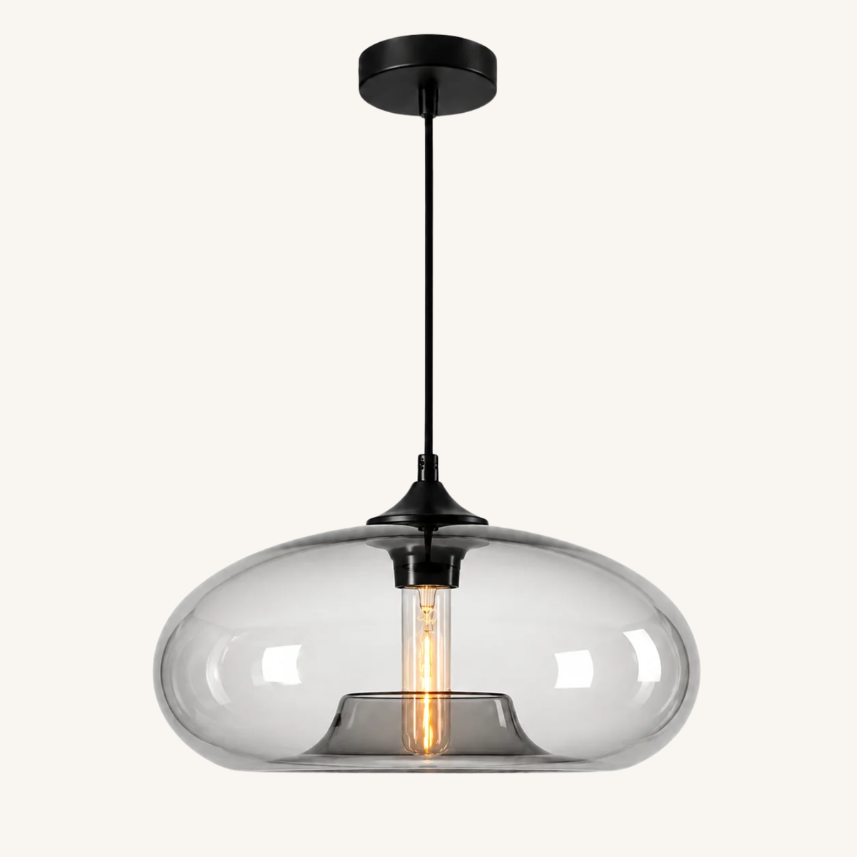 Suspension Ovéa, globe ovale en verre transparent et ampoule à filament